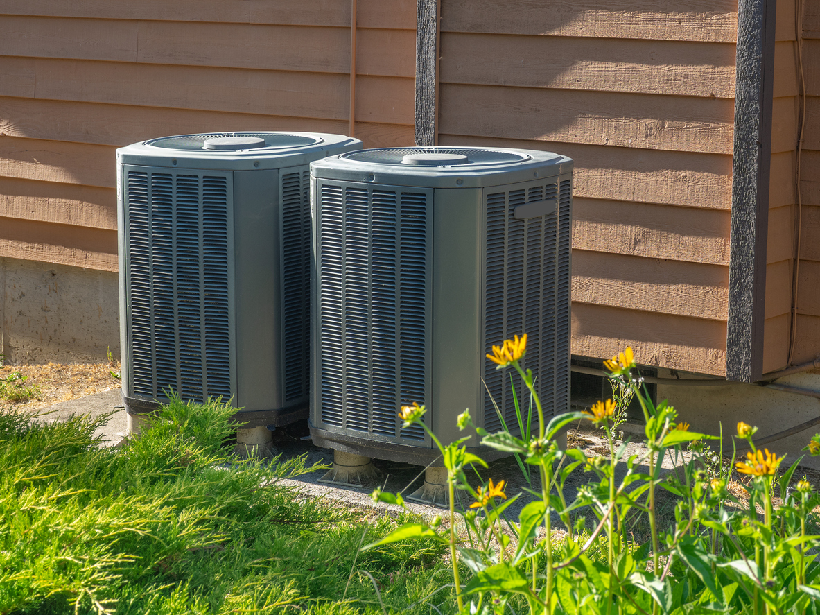 Air conditioning units outside an apartment complex Air conditioning units outside an apartment complex